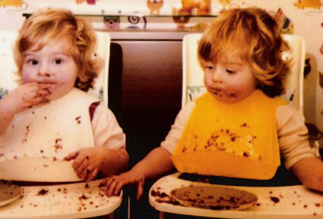 This is my sister and I at about 18 months - she is stealing my cake crumbs!